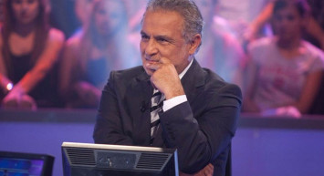 Kenan Işık Kimdir? 