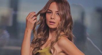 Bahar Şahin beyazlar içinde kuğu gibi oldu! Derin göğüs dekoltesi görenlerin aklını başından aldı