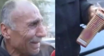 Elinde bisküvisi ile enkaz başında iyi bir haber bekliyordu: Bir oğluna kavuştu