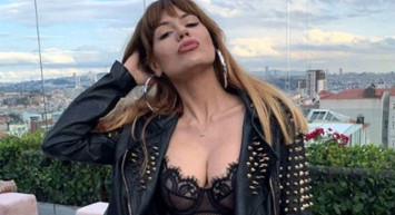 Nihal Candan'ın havuz başı pozu sosyal medyayı salladı! Candan kırmızı bikinisiyle adeta ateş saçtı