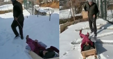 Bursa'nın Osmangazi İlçesinde Bir Köy Muhtarı Engelli Kız İçin Kızak Yaptı!