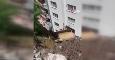 Freni boşalan kamyon apartman ile duvar arasına girdi: 2 daire zarar gördü