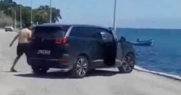 İzmir'de Bir Kişi Lüks Cipi Denize Attı