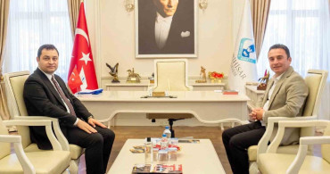 Kaymakam Yunus Emre Temel'in ilk ziyareti Başkan Habil Dökmeci'ye