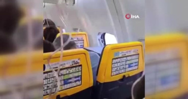 Uçuş sırasında yolcu, kırılan camdan dışarı uçma tehlikesi atlattı