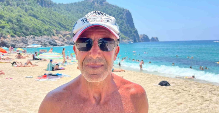 Alanya'da hava sıcaklığı 33 dereceyi buldu, turistler denizde serinledi