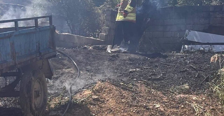 Altınözü'nde bahçedeki yangın römorka sıçradı
