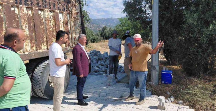 Buharkent'te bozulan sokaklarda kilit parke çalışması devam ediyor