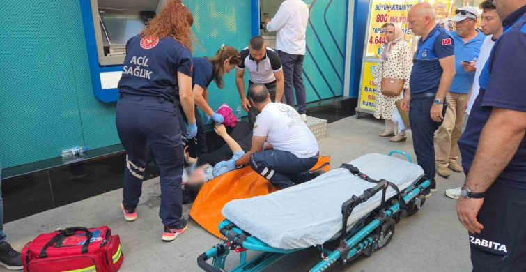 Hamile kadın ATM'de para çekerken baygınlık geçirdi