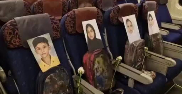 İran Heyetinin Uçağına Çocukların Anısına Sembol Girişim