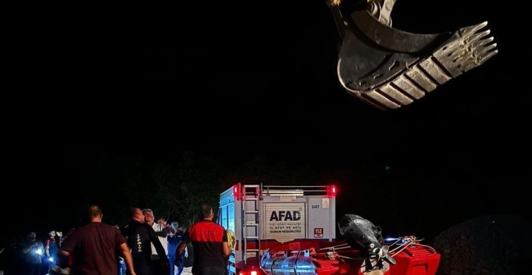 Kezer çayı'nda mahsur kalan genç, kepçeyle kurtarıldı