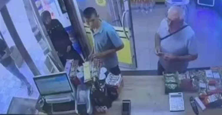 Kocasına silahla saldırmaya çalışan kadının tutukluk anı kamerada
