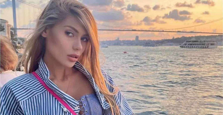 Nihal Candan çok konuşulan sosyal medya paylaşımlarına hız kesmeden devam ediyor! Göğüs dekolteli derin yırtmaçlı elbisesiyle boğaza karşı poz verdi