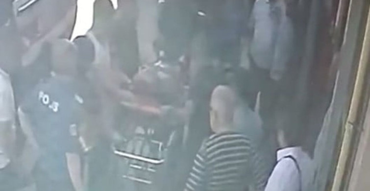 Tamir etmek istediği otomobilin altında kalan kaporta ustası yaralandı