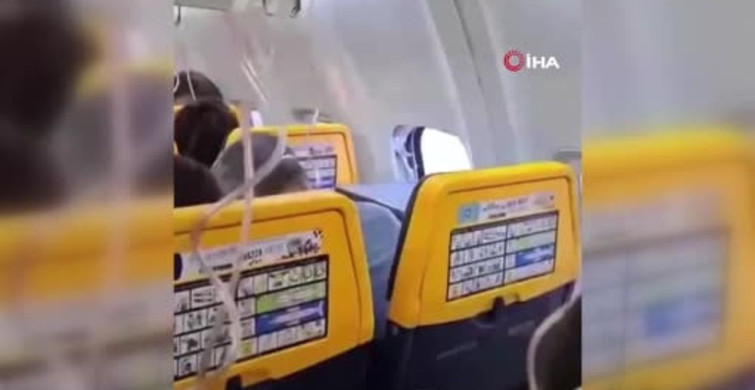 Uçuş sırasında yolcu, kırılan camdan dışarı uçma tehlikesi atlattı
