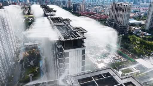 Çin'in Yuncheng kentinde bir sitede binaların çatılarına kurulan sisleme sistemiyle, sıcaklık...