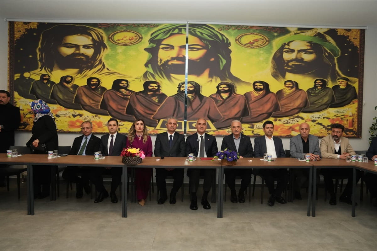 Kültür ve Turizm Bakanı Mehmet Nuri Ersoy (sağ 5), Ümraniye Kazım Karabekir Cemevi'nde düzenlenen...