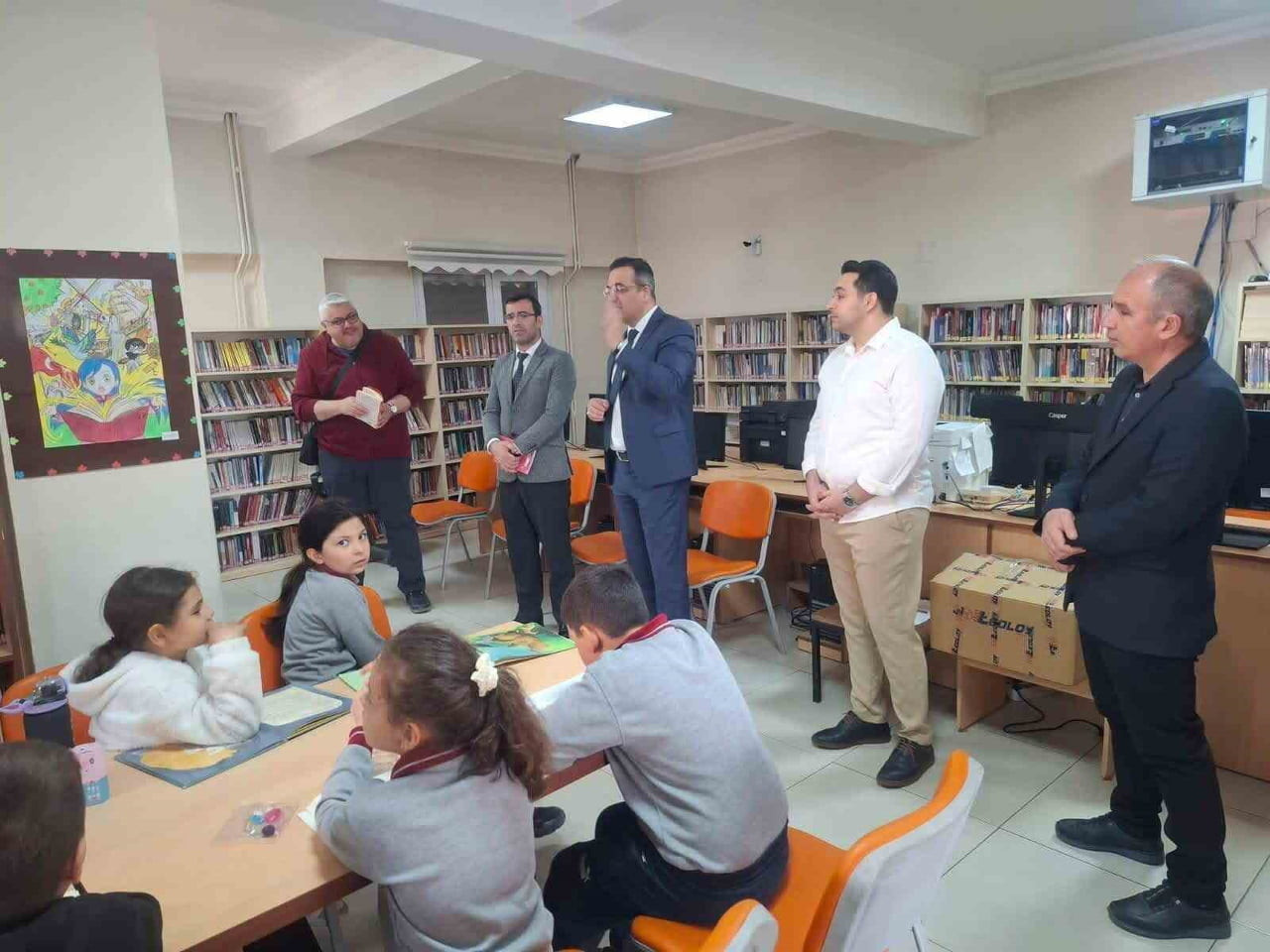 MANİSA’NIN SARIGÖL İLÇESİNDE KÜTÜPHANE HAFTASI ETKİNLİKLERİ KAPSAMINDA İLÇE KAYMAKAMI HALİL DALAK...