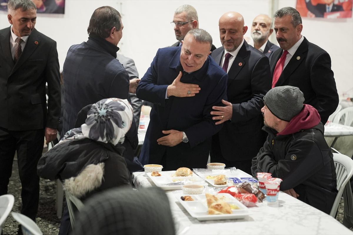 MHP Genel Başkan Yardımcısı İzzet Ulvi Yönter (sağ 3), Tuzla'da partisinin İlçe Başkanlığınca...