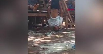 Endonezya'da Bir Aile, Kızlarıyla İzinsiz Aynı Evde Kalan Genci Bacaklarından Astı