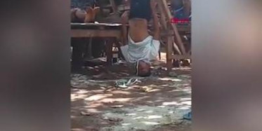 Endonezya'da Bir Aile, Kızlarıyla İzinsiz Aynı Evde Kalan Genci Bacaklarından Astı